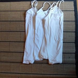 3 white tank tops